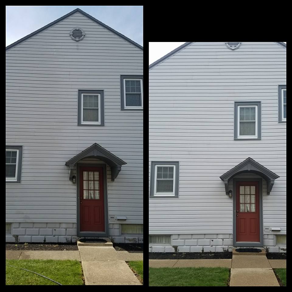 white vinyl siding of home power washed
